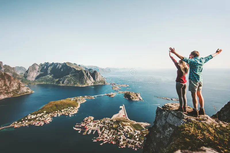 happy-couple-love-travel-raised-hands-cliff-happy-couple-love-travel-raised-hands-cliff-norway-man-woman-112188598.webp